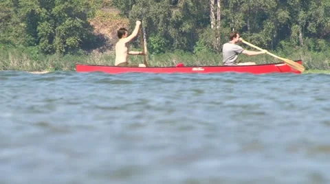 Two in a Red Canoe Stock Footage