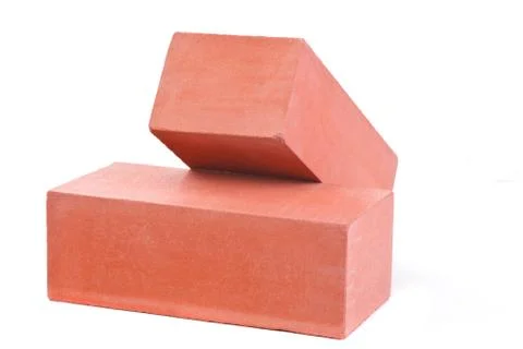 Two red ceramic bricks at the white background, isolated Stock Photos