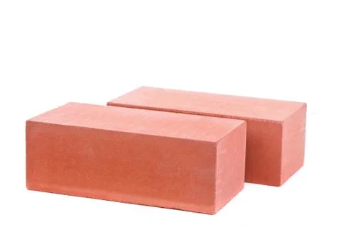 Two red ceramic bricks at the white background, isolated Stock Photos