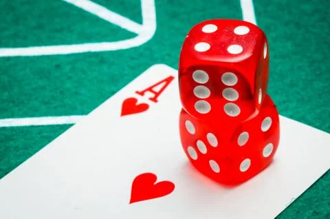 Two red dice and ace Stock Photos