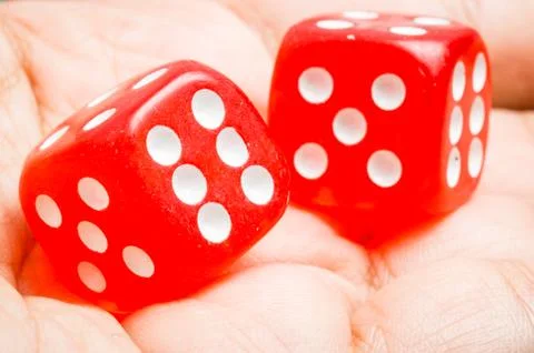 Two red dice Stock Photos