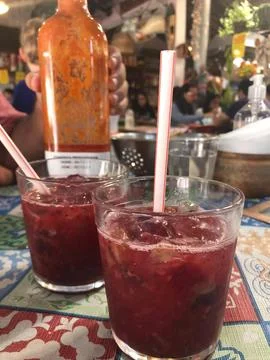 Two red drinks Stock Photos