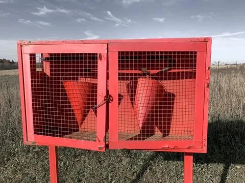 Two red fire buckets, pails on a firifighting shield, prevention and extingus Stock Photos