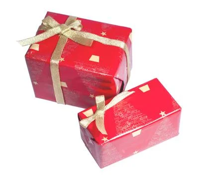 Two red gift boxes with a gold bow are insulated on a white background Stock Photos