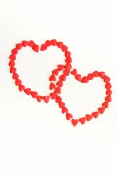 Two Red hearts pattern isolated on white background top view with copy space, Va Stock Photos