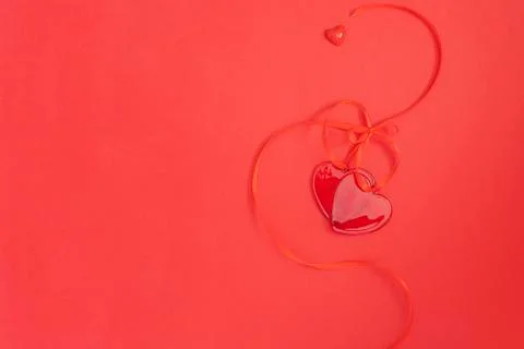 Two red hearts on red background. Monochromatic effect. Love and Saint valent Stock Photos