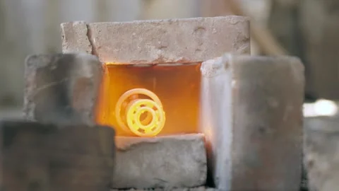 Two red-hot bearings in the fire. bearings heated with a gas burner. red-hot  Stock Footage 140323117