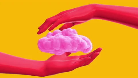 Two red human hands holding pink cloud isolated on yellow background. Stock Footage 180901177