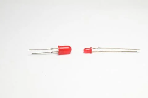 Two red LEDs (light emitting diodes) on a white background. Stock Photos