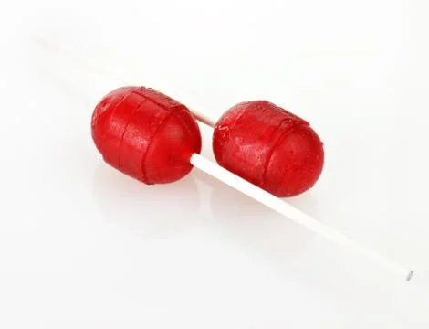 Two red  lollipops Stock-Fotos