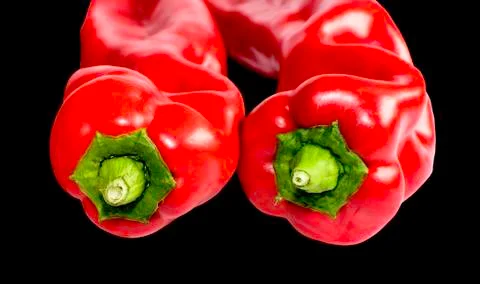 Two red paprika fronts. Stock Photos