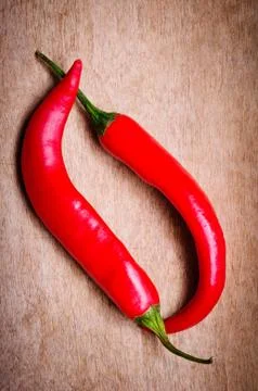 Two red pepperoni Stock Photos