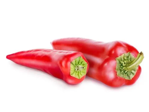 Two red peppers with green tail isolated on white background. Retouched peppers Stock Photos