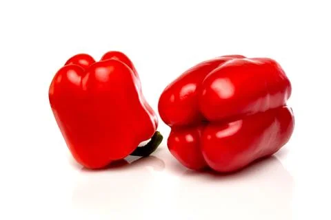 Two red peppers on a white background Stock Photos