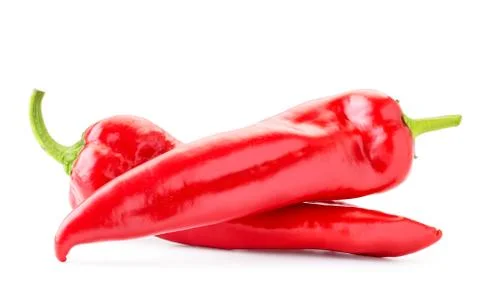 Two red peppers on a white background. Isolated. Stock Photos
