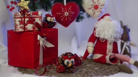 Two Red Photo Frames Are Placed Among Christmas Gifts Under a Fir Tree Intended Stock Footage 72887284