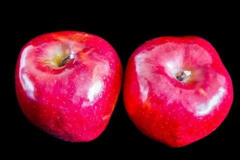 Two red ripe apples on black background Foto stock