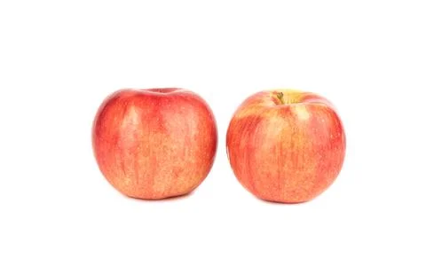Two red ripe apples isolated on a white background. Stock Photos