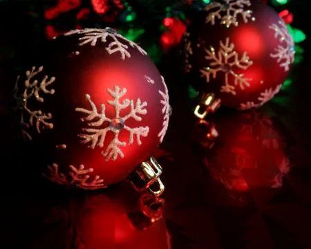 Two Red Snowflake Baubles Stock Photos