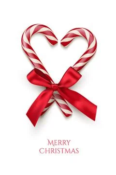 Two red striped candy cane in heart shape with red bow and Merry Christmas text Stock Illustration