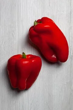 Two red sweet peppers. Stock Photos