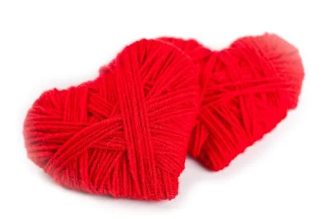 Two red thread hearts Stock Photos
