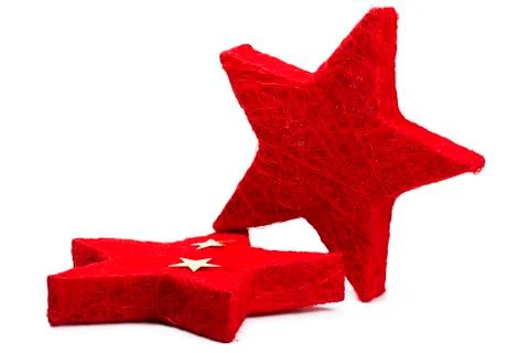 Two red thread stars one lies Foto stock