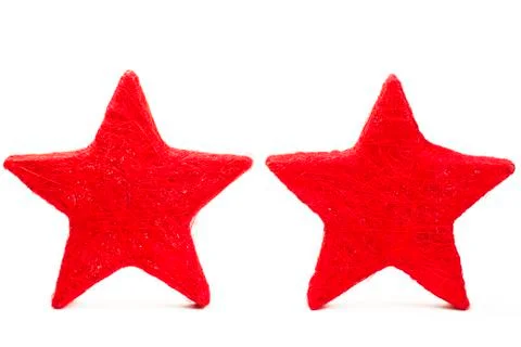 Two red thread stars standing Stock Photos