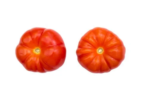 Two red tomatoes on a white background. Stock Photos