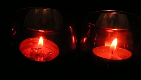 Two red votive candles Stock Footage 11019595