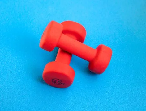 Two red weights Stock Photos