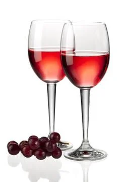 Two red wine with grapes Stock Photos