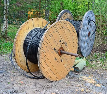 Two reels wound by a cable Stock Photos