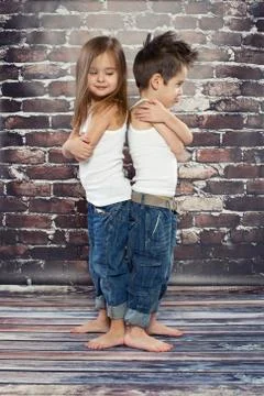 Two resentful kids in studio Stock Photos