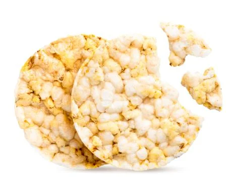 Two rice bread with broken pieces on a white, isolated. Round crispbread Stock Photos
