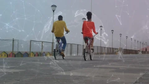 Two riders riding side-by-side away passing posts as frames advancing globe Stock Footage 330355615