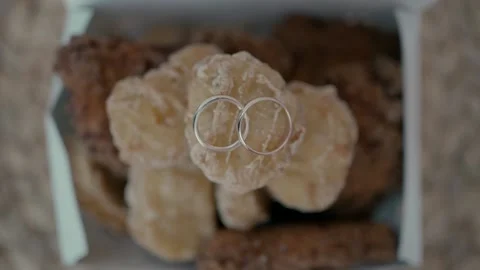 Two rings on nuggets close up Stock Footage 220372636