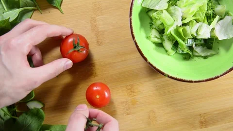 Two ripe chili tomatoes on the table. Stock Footage 122986516