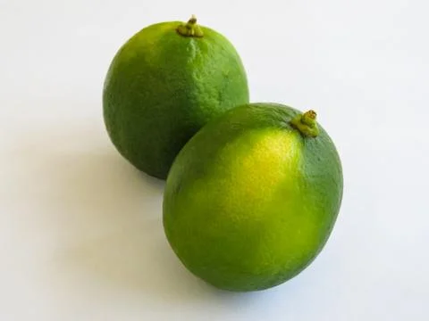 Two Ripe Lemons on White Background. Stock Photos
