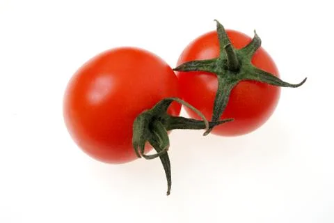Two ripe red Cherry tomatoes Stock-Fotos