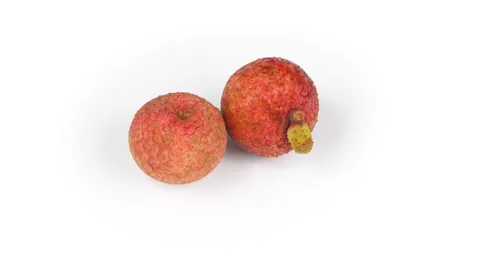 Two Ripe Red Lychee Fruits Rotating on Clean White Background Vídeos de archivo 337326950