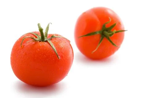 Two ripe tomatoes isolated Stock Photos