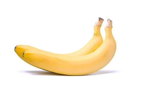 Two ripe yellow bananas on a white background Stock Photos