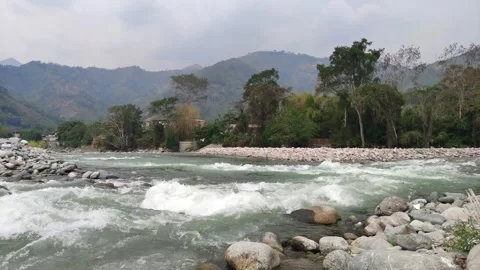 Two rivers flowing into a single river in Peru Vídeo Stock 283193290
