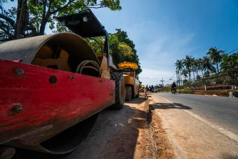 Two road rollers working on the new roads construction site. Heavy duty Stock Photos