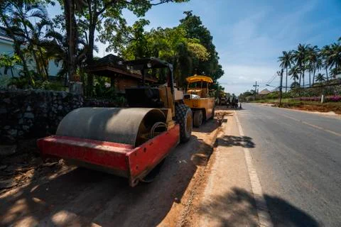 Two road rollers working on the new roads construction site. Heavy duty Stock Photos