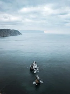 Two rocks in the sea Stock Photos