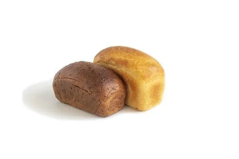 Two rolls of wheat and rye flour bread in close-up on a white background Stock Photos