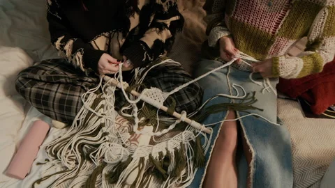 Two Roommates Making Home Decor Using Macrame Pattern in Dorm Room Stock Footage 300459333