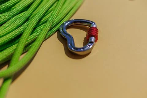 Two ropes with secure knots are connected by a carabiner. Equipment for rock  Stock Photos